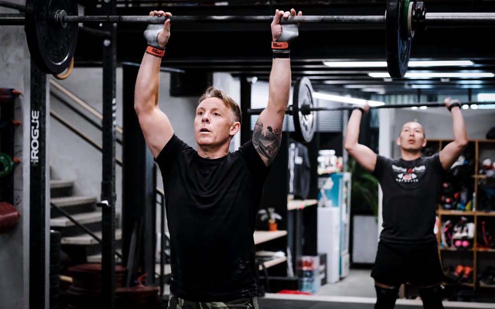 Paul Fox lifting weights