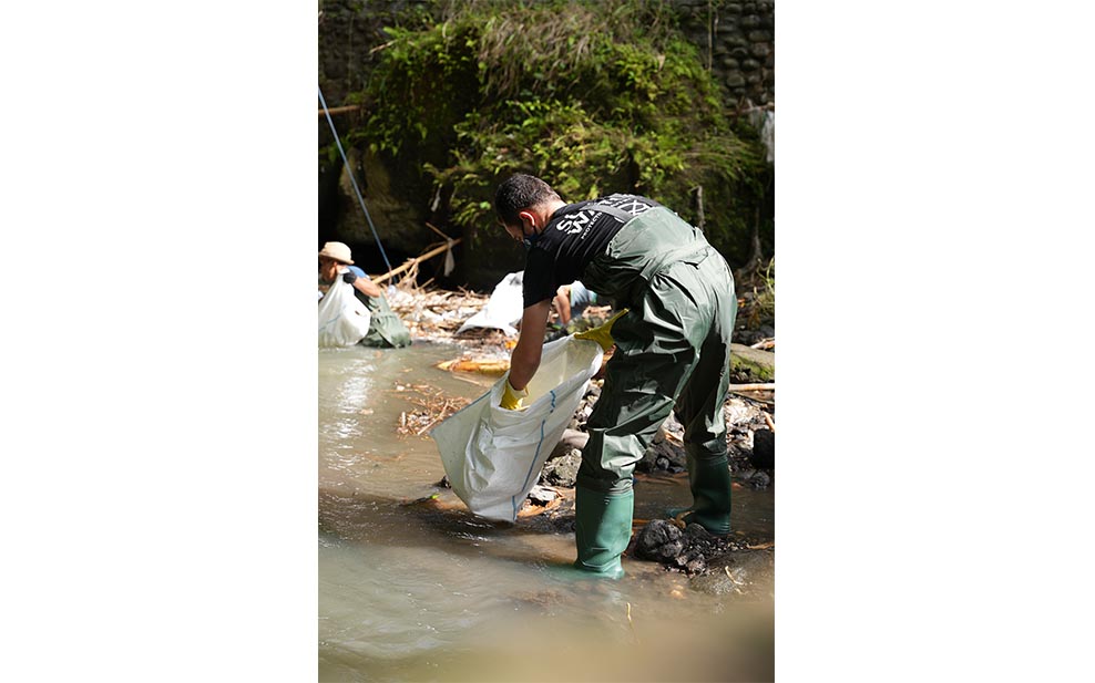 Cleaning up river.