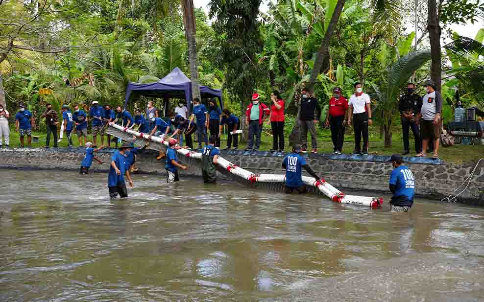 Putting barrier in river