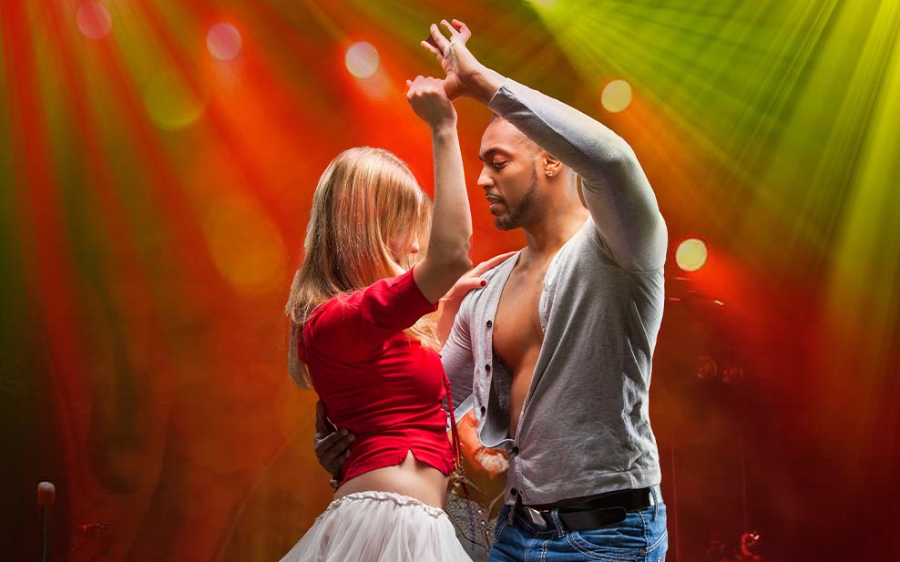 Young couple dances Caribbean Salsa