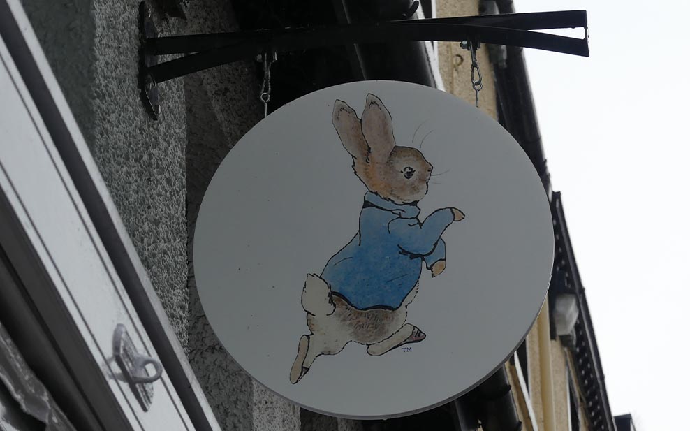 The 'Peter Rabbit and Friends' shop, featuring a sign of the iconic character.